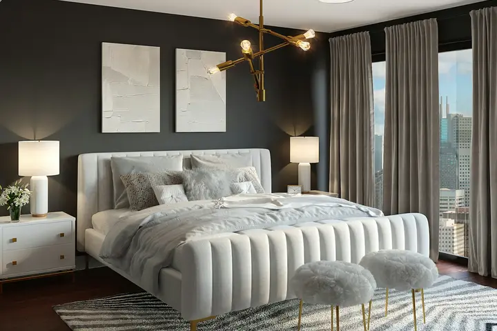 Quarto com cama branca e luz suave, sem pessoas.